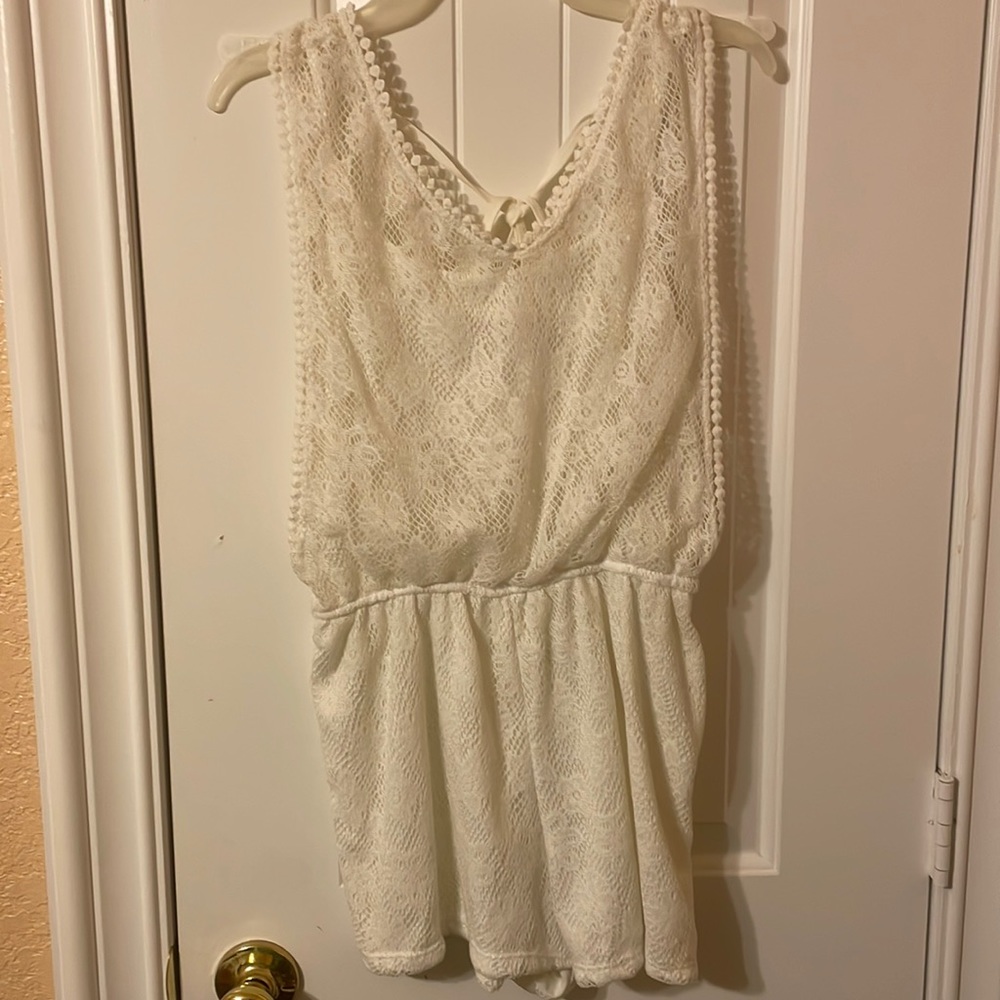 White Lace shorts romper.  Comfortable and Light weight 100% Poly
